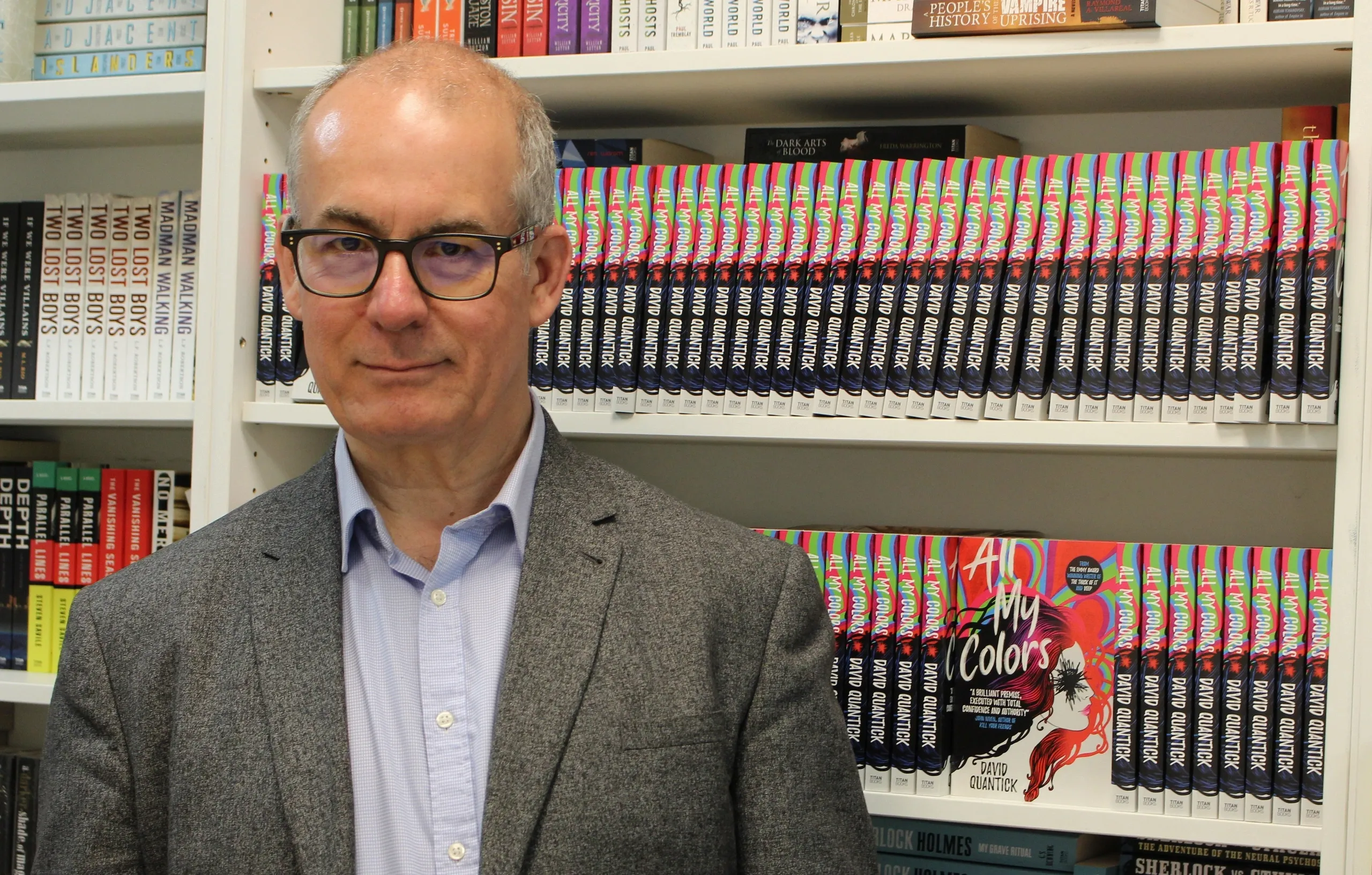 David Quantick standing by some books